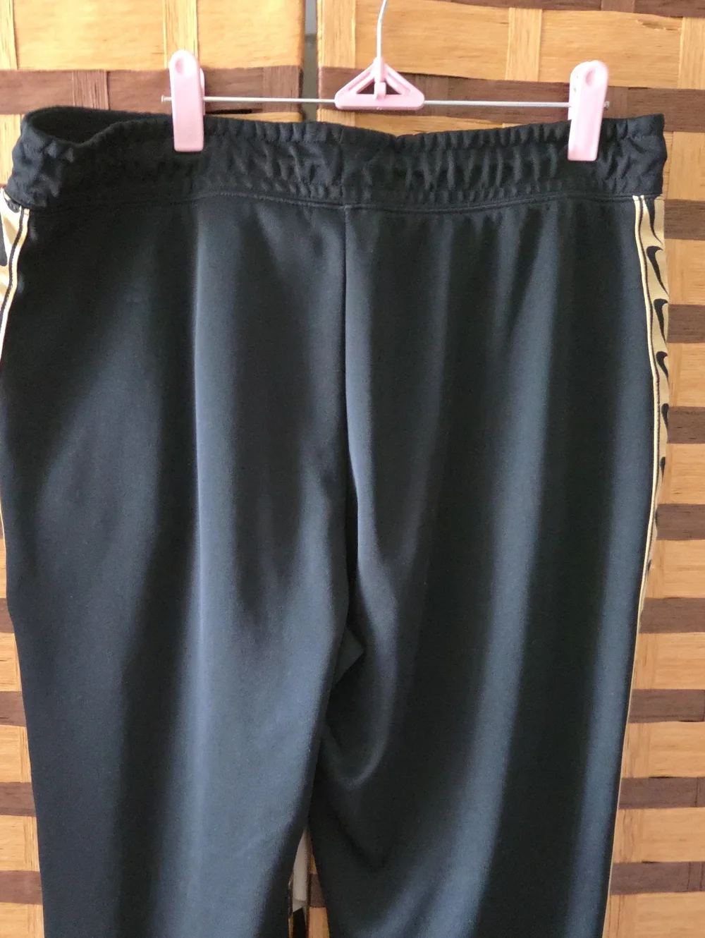 Nike  Black Track Pants with Contrasting Gold Side Stripe